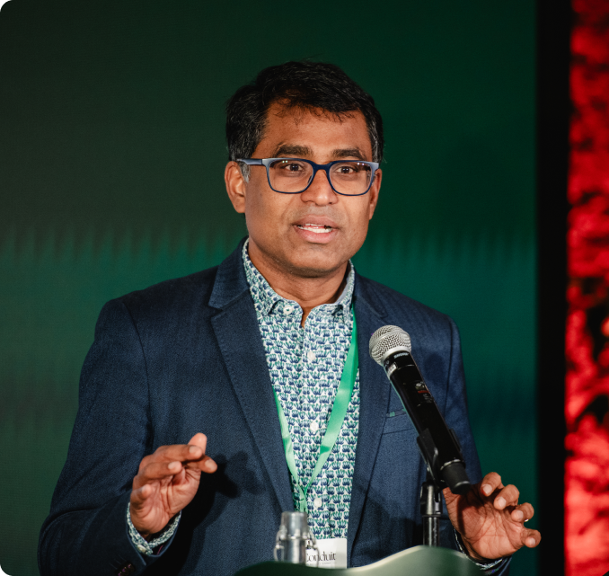 Day2_OpeningRemarksKeynote_SolutionsLab_RefugeeSummit_2024_TheConduit-7 1